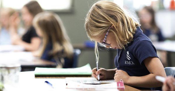 Students practicing handwriting