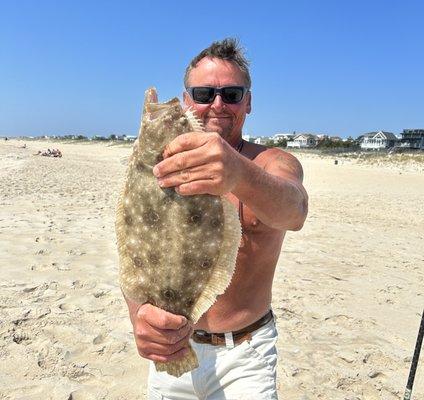 Carl Hartman caught this fluke aka summer flounder off the LBI beach. Shop with us for all of your beach and boat fluke fishing tackle needs