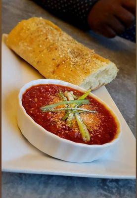 Fresh bread with red sauce.