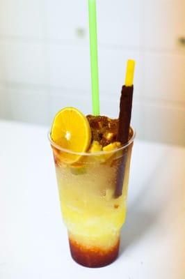 "La Russa" is made with fresh pineapple, oranges, limes and grapefruit soda over shaved ice.