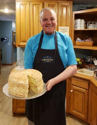 Chef John with a scrumptious Coconut Creme Cake.