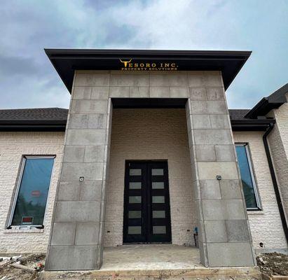 Here we added stone to the entire entry way for a grand opening to the home!