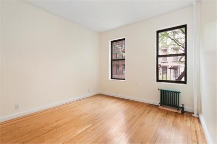 Beautiful wood floors and fresh paint enhances this room.