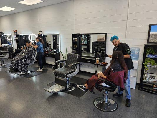 Marcelo, our barber stylist on the right.
Gabby on the left