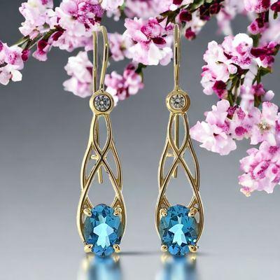 Drop earrings with fabulous woven gold details, enhanced with blue topaz and lab grown diamonds.