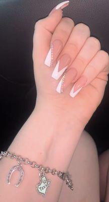 Long modern french style nails with stones