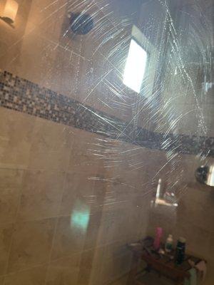 Scratched up my shower glass while "cleaning"-etched into the glass so destroyed