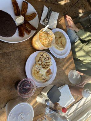 Pupusas, curtido, plantains, agua de Jamaica , agua de horchata