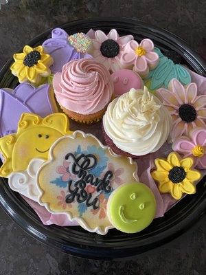 Tray of cookies & two cupcakes without the cover - look the the detail - the sun has blushing cheeks with sparkles!