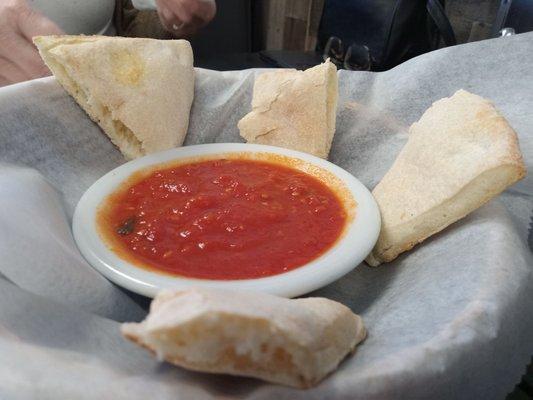 Fresh house made bread with marinara dipping sauce.