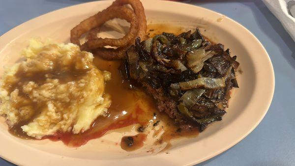 Hamburger steak with onions and peppers and mash potatoes