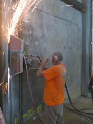 Interior concrete wall sawing through an 8" thick tilt wall in South Orlando