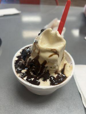 Graham Cracker frozen yogurt with Oreo and hot fudge.