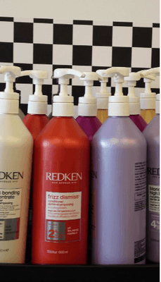 The Edit Walk-In Salon in Tulsa uses Redken hair products