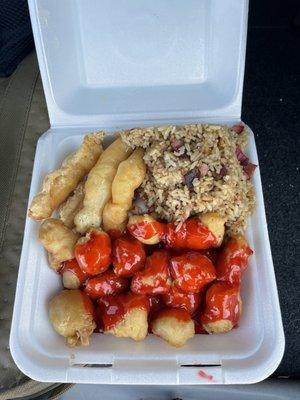 Sweet and sour chicken, fried shrimp and pork fried rice.