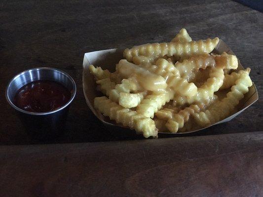 Crinkle cut fries cheese fries.