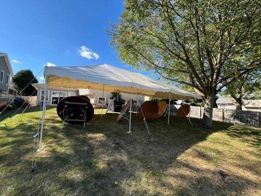 20'x40' White Canopy Tent, with 6-6' Round Tables. Edison Lights set up.