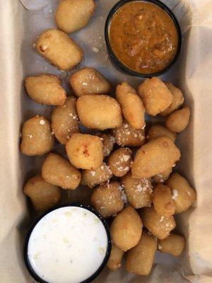 Beer Battered Cheese Curds: Topped with Parmesan cheese, parsley, ranch, and marinara