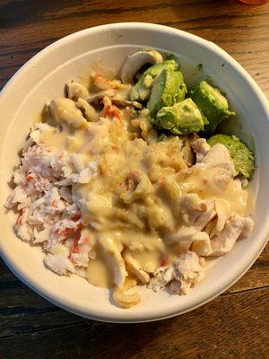 Baked potato w/what I picked from the salad bar and soup station. The crawfish pepper Jack soup as a potato sauce is A-mazing.