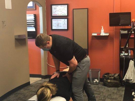 Dr. Tyler adjusting the lower back and hips