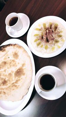 Hummus, bread, and Yemeni chi