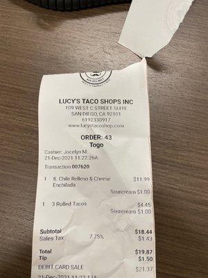 My receipt. Notice that I paid two dollars extra to receive sour cream. I also gave them $1.50 tip in advance for service I did not receive.