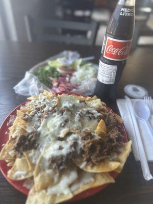 Birria Nachos and a side of Coke