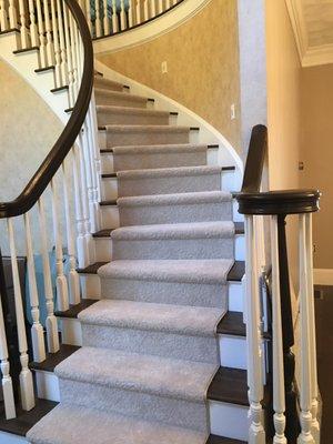 Broadloom carpet used to make a bound runner on this gorgeous bridal staircase