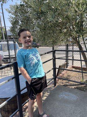 My son after his first haircut here