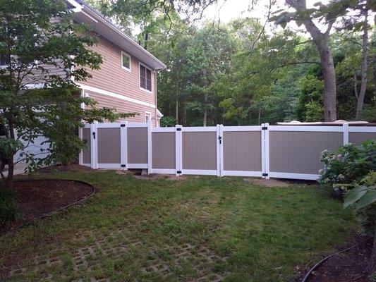 10 foot wide vehicle gate with drop-rods for added rigidity and security. There is a 4 foot wide man-gate on the left