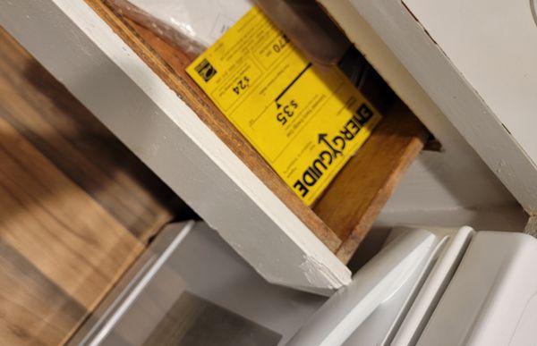 The ONE drawer in the kitchen. Can't even open it because the stove blocks it.