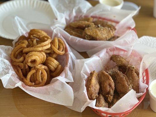 Curly Fries and Old Bay Butter Garlic