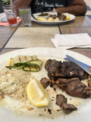 Lamb chops rice pilaf and zucchini. I added tzatziki sauce because I love how they taste together. So why not!?!