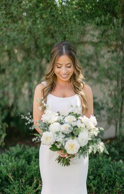 Emily and her lush, all-white bridal bouquet at the Santa Barbara Club