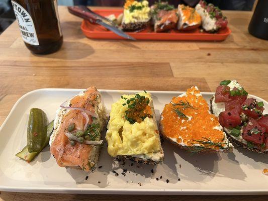 From left to right: rökt lax, salmon mousse soft scramble, smögen, zoey's poke.