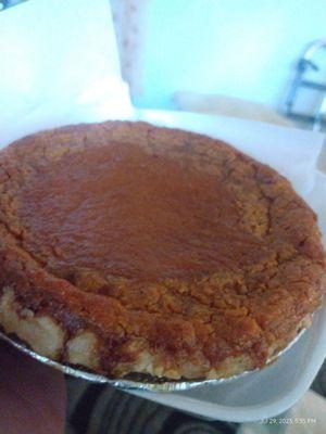 An individual deep dish sweet potato pie.