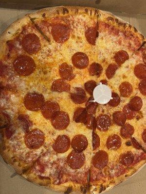 Pepperoni pizza .Frozen dough and bland tasting