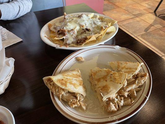 From the appetizers menu: Beef, Bean & Cheese Nachos and Chicken & Cheese Quesadilla. Both were good and filling too.