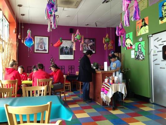 Colorful and festive interior with 10 tables.