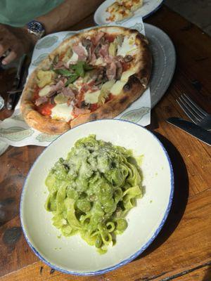 Pizza and fresh pasta with pesto