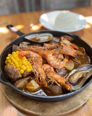 Seafood special - Seared salmon, fingerling potatoes, boiled shrimps, new zealand mussels, clams, and fresh corn with rice.