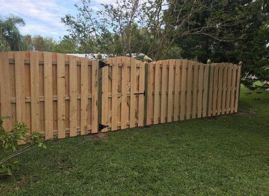 Arched Vertical Shadow Box Fence with Gothic Top Posts