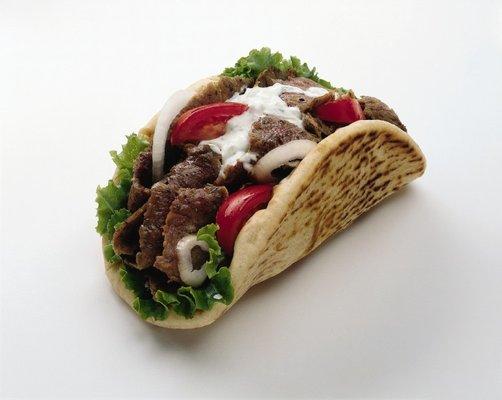 LAMB GYRO.
 Serves with salad, white sauce, hot sauce, green sauce,BBQ sauce.