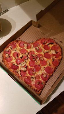 Valentine's day special heart shaped pizza, mushroom and pepperoni