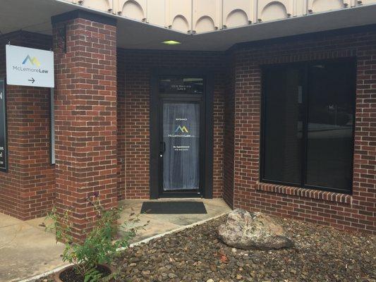 Entrance to McLemore Law in historic downtown Fayetteville, Arkansas