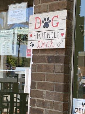 Letting you know they are dog friendly, but only on the deck.