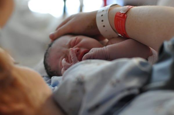 This is one of the amazing photos Caitlin took of our daughter's birth. Thank you, Caitlin!