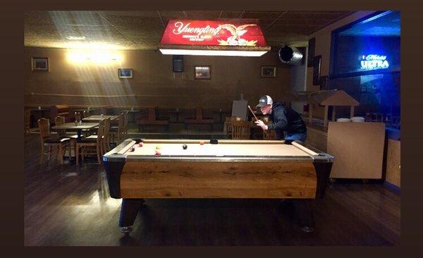 Pool table in the non-bar area.