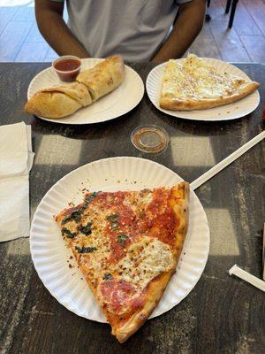 Pepperoni roll, margherita slice, and white.  Not greasy at all so dam delicious!