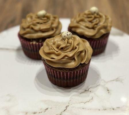 German chocolate sponge with coffee buttercream and an espresso bean on top